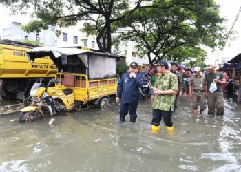 Banjir Meluas Hingga ke Periuk Damai