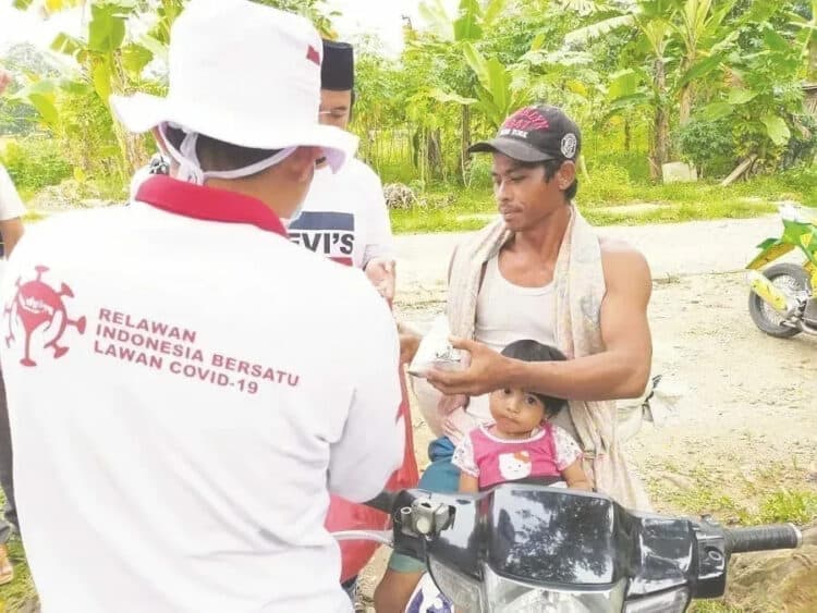 Selama Seminggu untuk Buka Puasa, Relawan Bagikan Ribuan Nasi Bungkus