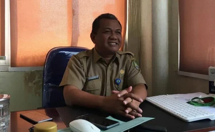 BAHAS RAPERDA: Kepala Bidang Olahraga Dinas Pemuda dan Olahraga (Dispora) Kota Tangerang Ujang HG  membahas poin Raperda Olahraga.  (DZIHNI ISMA HANIFAH/SATELIT NEWS)