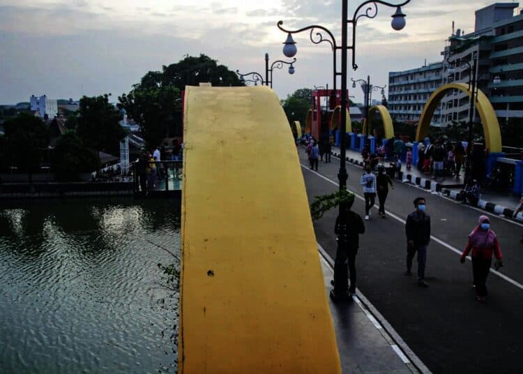Potret Warga Mulai Berlibur di Kawasan Jembatan Berendeng