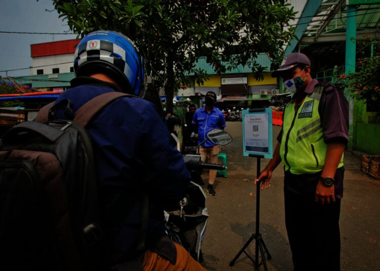 Potret Penerapan Aplikasi PeduliLindungi di Pasar Tradisional