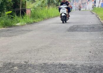 Pekerjaan ruas jalan Batubantar - Kadukacang, Kecamatan Cimanuk, Kabupaten Pandeglang, terancam tak dibayar. (NIPAL SUTIANA/SATELITNEWS.ID)