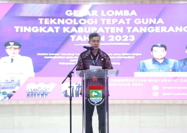 PEMAPARAN: Kepala DPMPD Kabupaten Tangerang Yayat Rohiman saat menyampaikan pemaparan terkait TTG di Kabupaten Tangerang. (DOK/SATELIT NEWS)