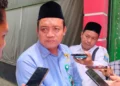 Ketua Baznas Kabupaten Serang, Badrudin, sedang di wawancara. (ISTIMEWA)