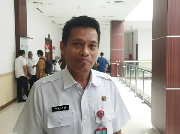 KERJA SAMA: Kepala DLH Tangsel, Wahyunoto Lukman menjelaskan soal kerjasama pengelolaan sampah. (EKO SETIAWAN/SATELIT NEWS)