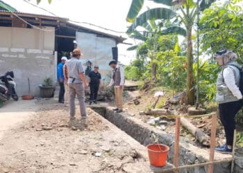 Proses pembangunan Rumah Pompa di Perumahan Vila Tomang Kelurahan Kutabaru, Kecamatan Pasar Kemis, Kabupaten Tangerang. (ISTIMEWA)