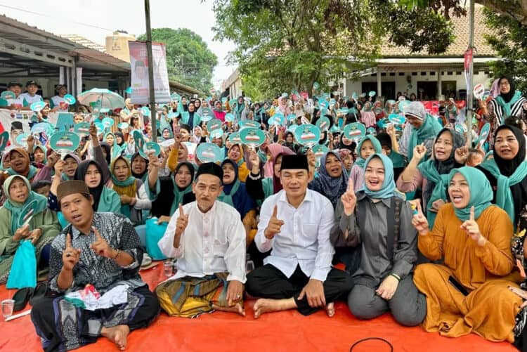 DUKUNGAN BERTAMBAH: Dukungan warga kepada Calon Bupati Tangerang nomor urut 1 H. Mad Romli terus bertambah. (ADITYA/SATELIT NEWS)