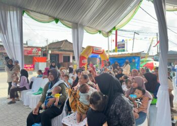 Alfamart bersama Baby Happy, kolaborasi dalam program Alfamart Sahabat Posyandu, yang digelar di 34 kota di Indonesia, Kamis (12/2/2026). (ISTIMEWA)