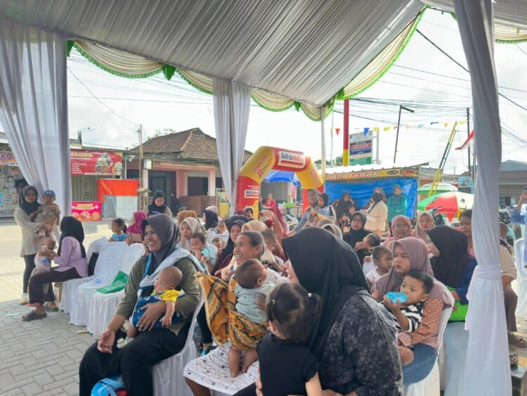 Alfamart bersama Baby Happy, kolaborasi dalam program Alfamart Sahabat Posyandu, yang digelar di 34 kota di Indonesia, Kamis (12/2/2026). (ISTIMEWA)