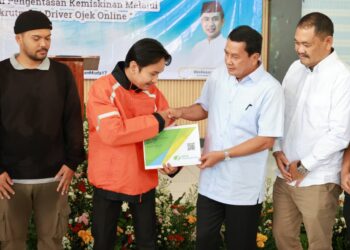 Bupati Tangerang Mochamad Maesyal Rasyid, saar menghadiri acara 'Langkah Berdaya dan Terlindungi: Gerakan Pengentasan Kemiskinan, Melalui Rekrutmen Driver Shopee' di Gedung Serbaguna (GSG) Kec. Kosambi, Jumat (27/2/2026).  (ISTIMEWA)