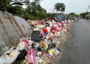 Sampah Liar Menumpuk di Jalan Rawa Kucing Neglasari