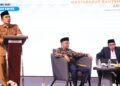 MENYAMPAIKAN SAMBUTAN : Kepala Biro Kesejahteraan Rakyat (Kesra) Sekretariat Daerah (Setda) Provinsi Banten Tubagus Rubal Faisal (diatas mimbar) menyampaikan sambutan. (ISTIMEWA)